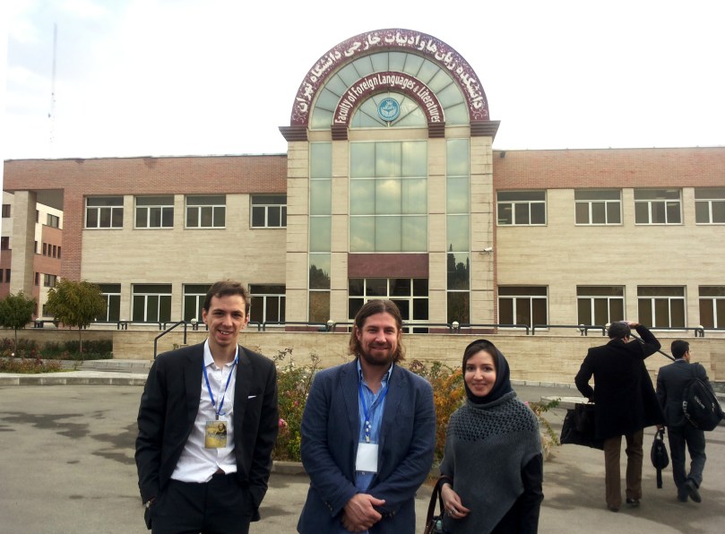 Outside the University of Tehran's Faculty of Foreign Languages and Literatures, accompanied by two colleagues